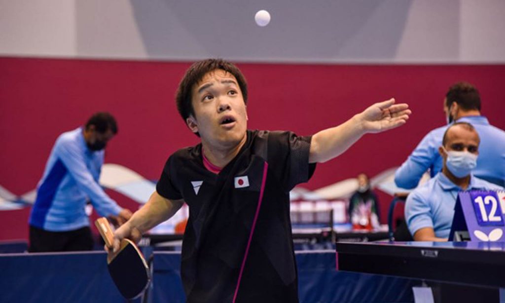 A Para Table Tennis player in action at the Bahrain 2021 Asian Youth Para Games.